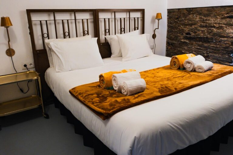 Golden Music Studio 6 – A luxurious music-themed apartment at Eco Resort Portugal, featuring golden accents, vinyl décor, and a vintage record player.